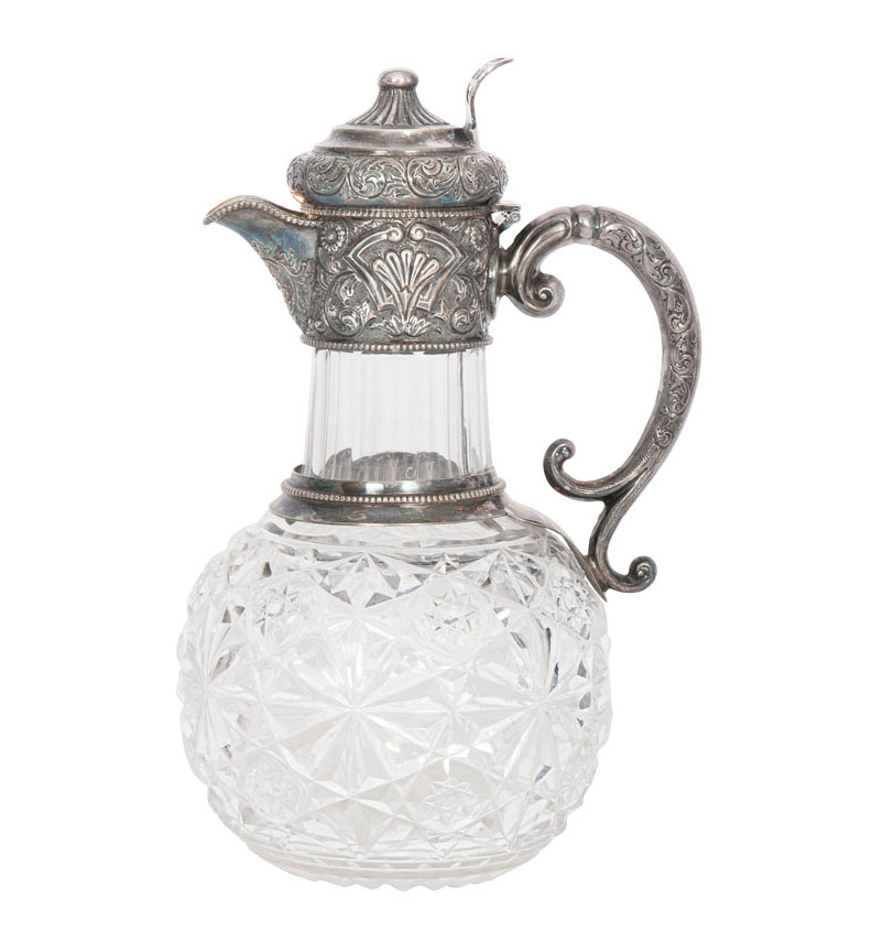An Edwardian glass decanter with silver mounting